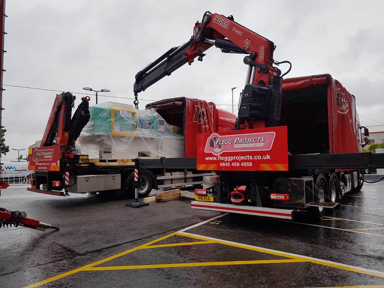 lorry and crane moving machinery