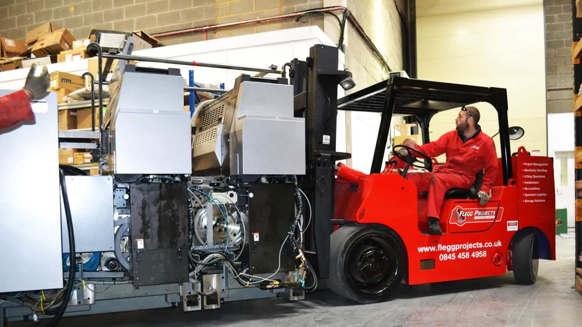 forklift driving equipment in a factory